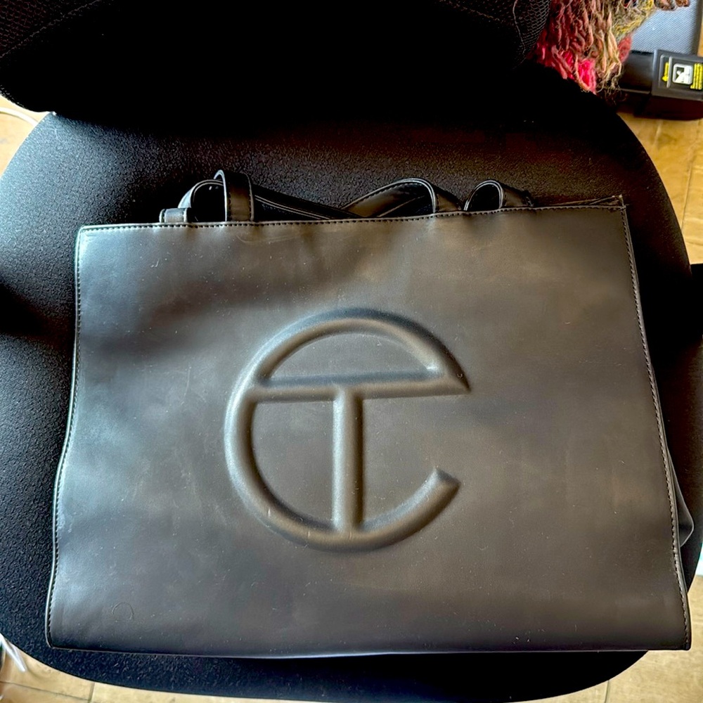 Large black Telfar shopping bag.